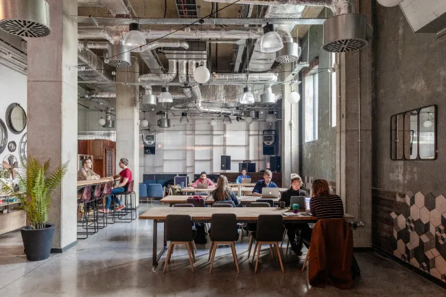 People working in a communal area